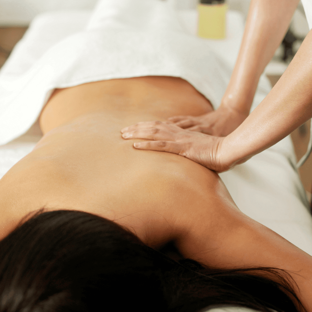 Therapeutic Massage Woman being massaged in a luxury spa